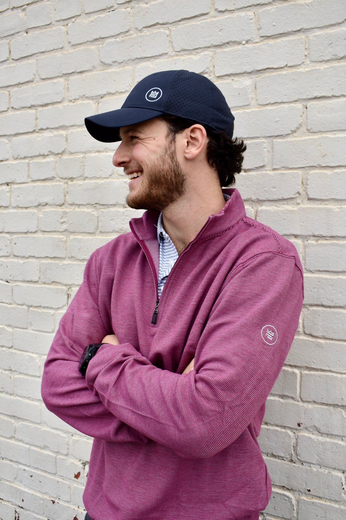 The Crimson Quarter Zip features a warm red and subtle silver stripe combination. It's breathability and stretch properties provide optimal mobility.
