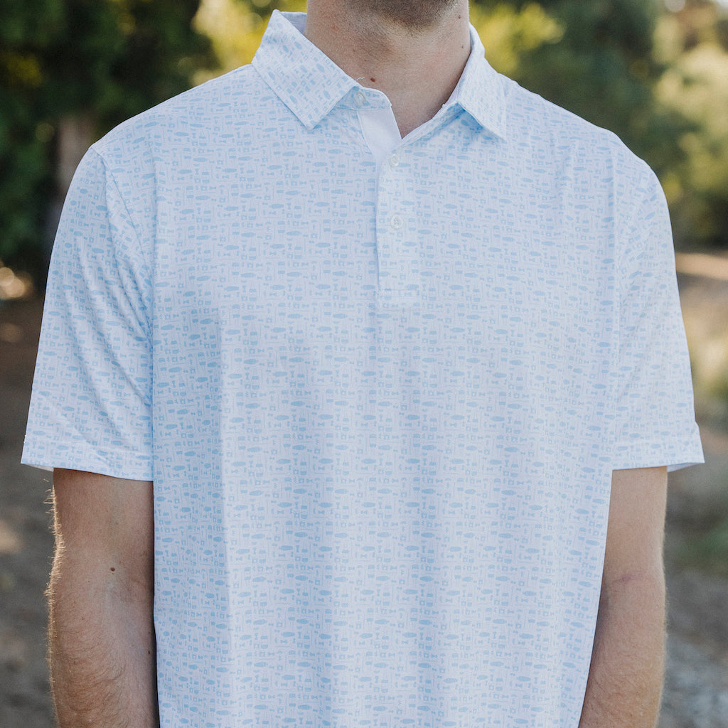 The Old Fashioned Polo is a brand new design featuring an Old Fashioned cocktail print and our classic performance golf polo fit. The Old Fashioned Polo is available in dark blue/ navy and light blue/ sky tones.